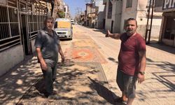 Tozdan Bunalan Mahalle Sakinlerinden Dikkat Çeken Çözüm