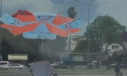 Adana Sıcağına Karşı İlginç Çözüm! Motosiklette Dondurma Şemsiyesiyle Yolculuk