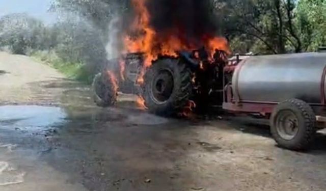 Alevlere teslim olan traktörde yaşanan patlama kameraya yansıdı