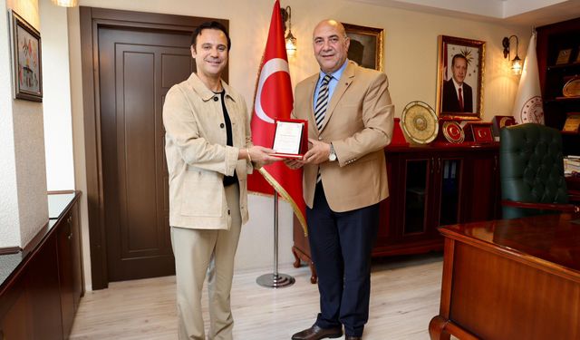 Milli Eğitim Müdüründen Gündoğdu'ya Teşekkür Plaketi